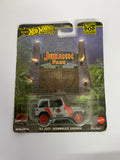 Hot Wheels Premium Pop Culture: Jurassic Park '92 Jeep Wrangler Sahara – 1:64 Scale Diecast Car (Real Riders)