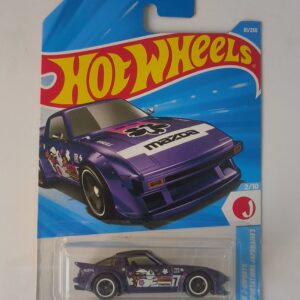 Hot Wheels Mazda RX-7 die cast car front angle view Mazda RX-7 Hot Wheels miniature side profile Hot Wheels RX-7 detailed wheels close up Mazda RX-7 die cast collectible car in packaging JDM Mazda RX-7 Hot Wheels model for collectors
