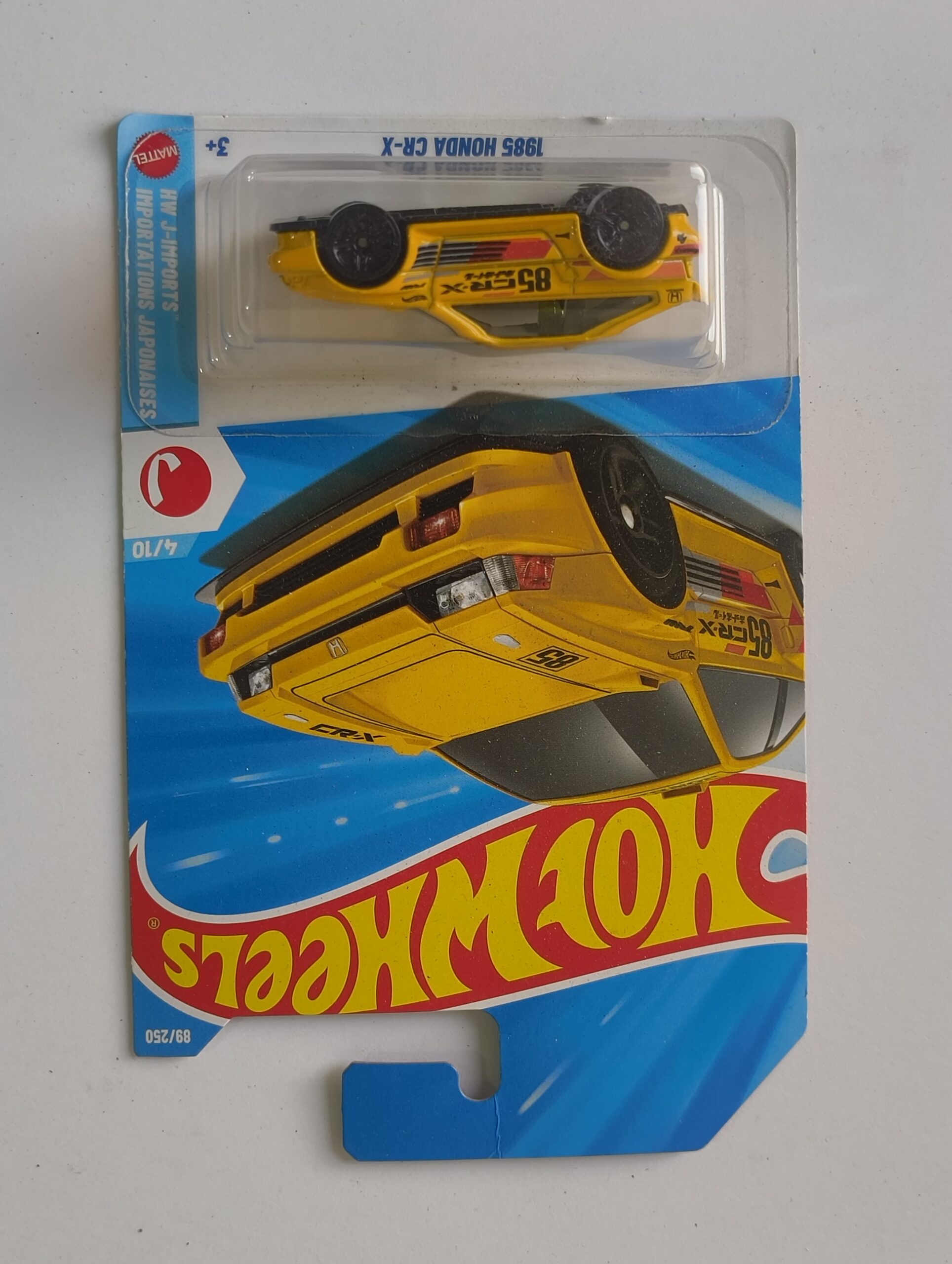 Hot Wheels 1985 Honda CRX die cast front angle view Honda CRX 1985 Hot Wheels side profile 1985 Honda CRX miniature hatchback detail Hot Wheels Honda CRX in original packaging Classic 1985 Honda CRX collectible die cast model
